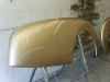 Rear wing in finishing coat